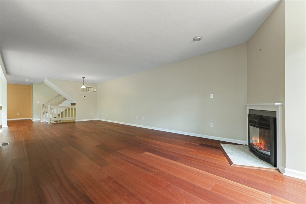 22 Arrowhead Circle, Unit 22 Ashland, MA 01721 - Photo 6 of 35 a view of empty room with wooden floor