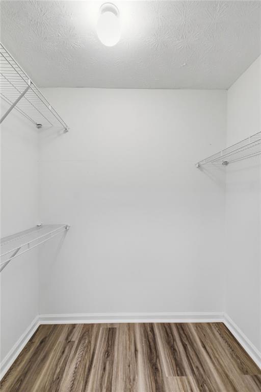 1150 Collier Road Northwest, Unit 24K Atlanta, GA 30318 - Photo 16 of 22 a view of small space with racks on the wall