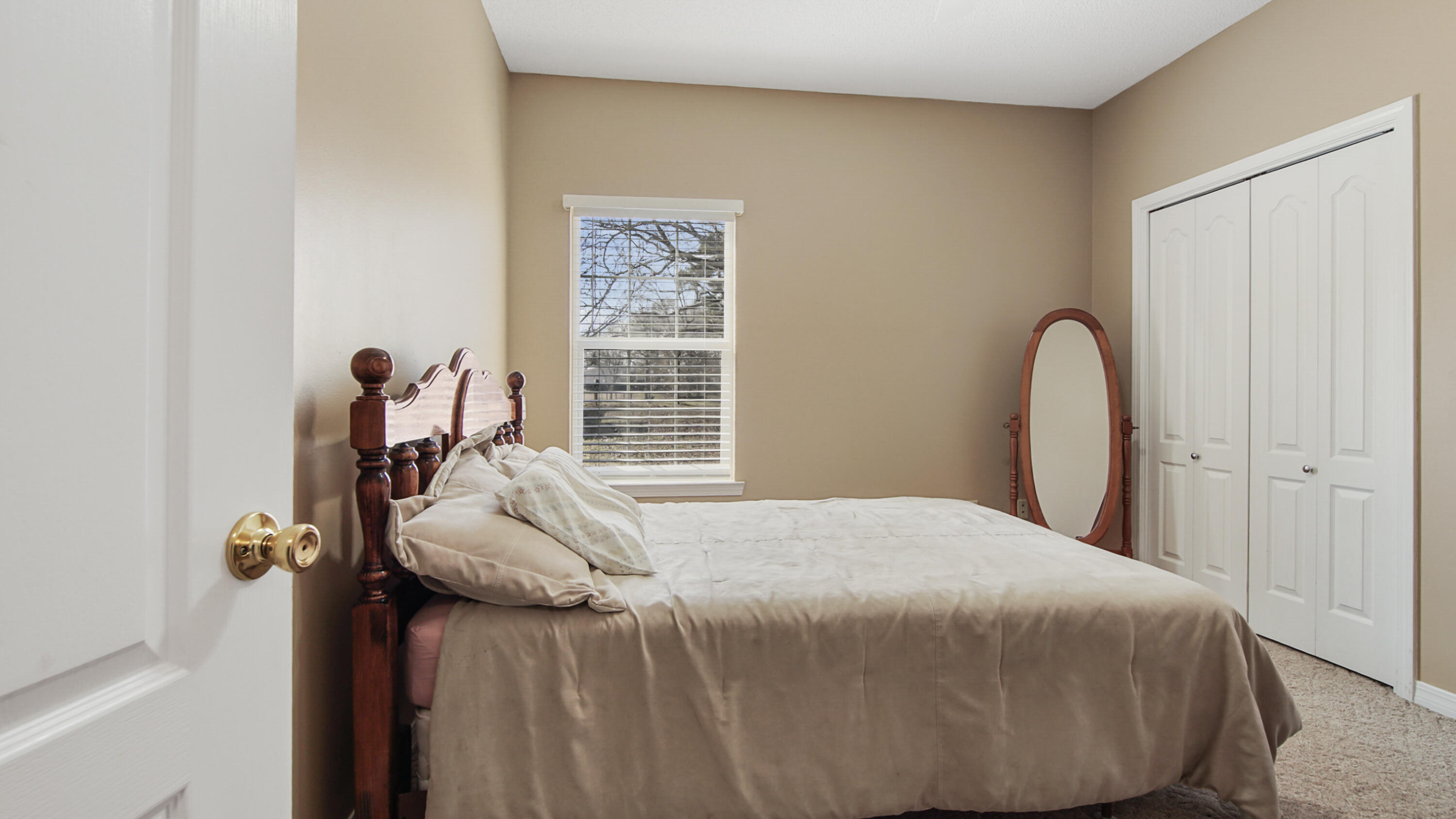 1333 Parrish Road Florala, AL 36442 - Photo 25 of 48 a bedroom with a bed and a window