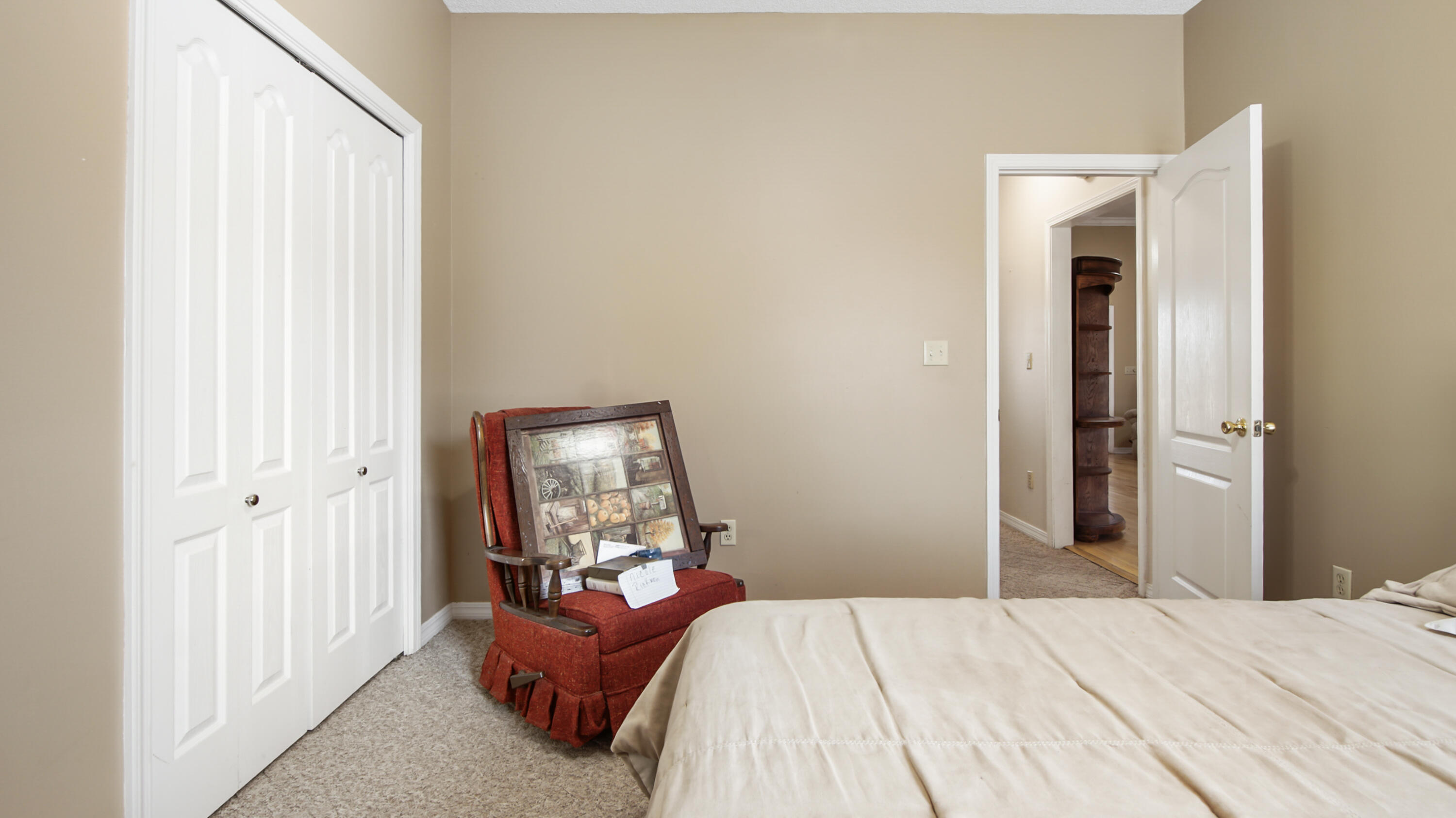 1333 Parrish Road Florala, AL 36442 - Photo 26 of 48 a bedroom with a bed and a mirror