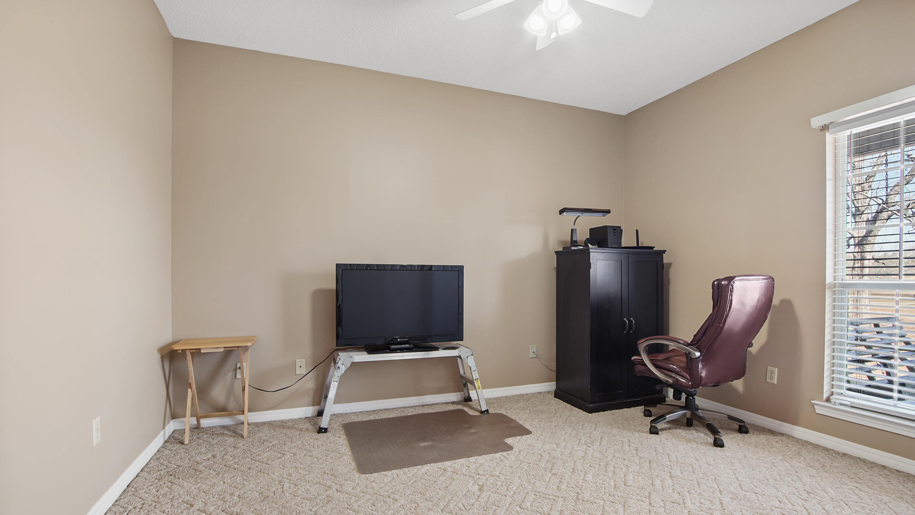 1333 Parrish Road Florala, AL 36442 - Photo 27 of 48 a view of a workspace with furniture and a window