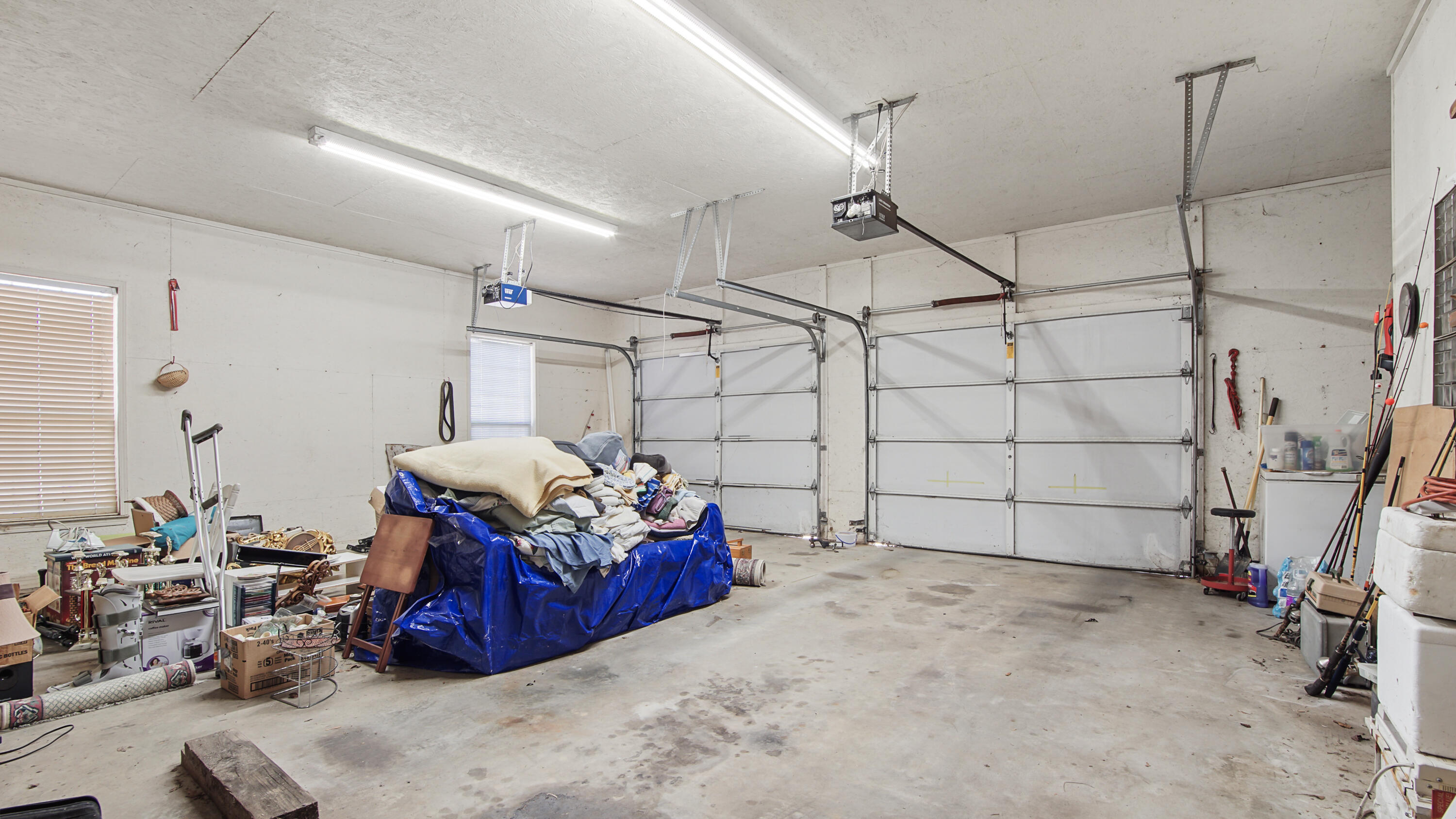 1333 Parrish Road Florala, AL 36442 - Photo 34 of 48 a bed room with furniture and a chandelier