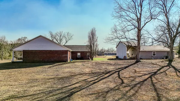 a view of a house with snow on the wall