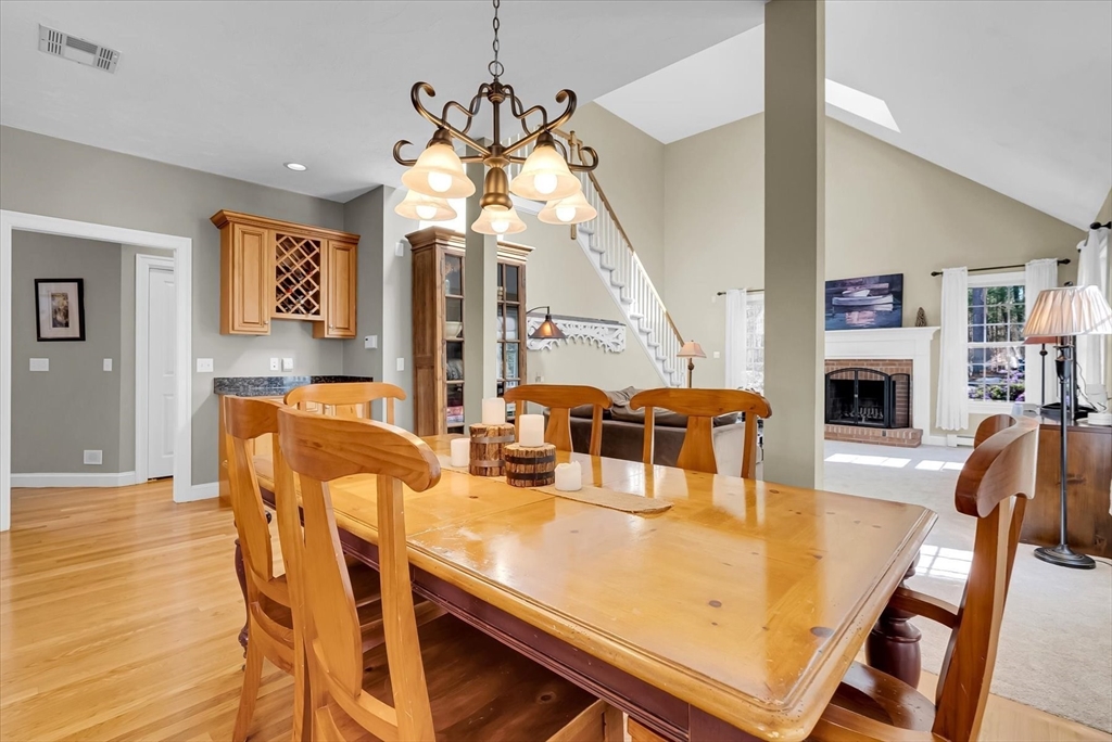 9 Juniper Road Upton, MA 01568 - Photo 13 of 42 a view of a dining room with furniture and wooden floor