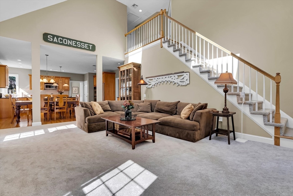 9 Juniper Road Upton, MA 01568 - Photo 15 of 42 a living room with furniture and white walls