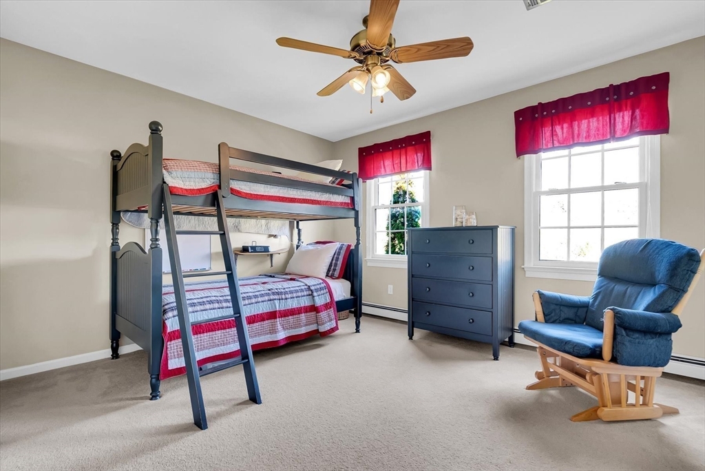 9 Juniper Road Upton, MA 01568 - Photo 20 of 42 a bedroom with furniture and a window