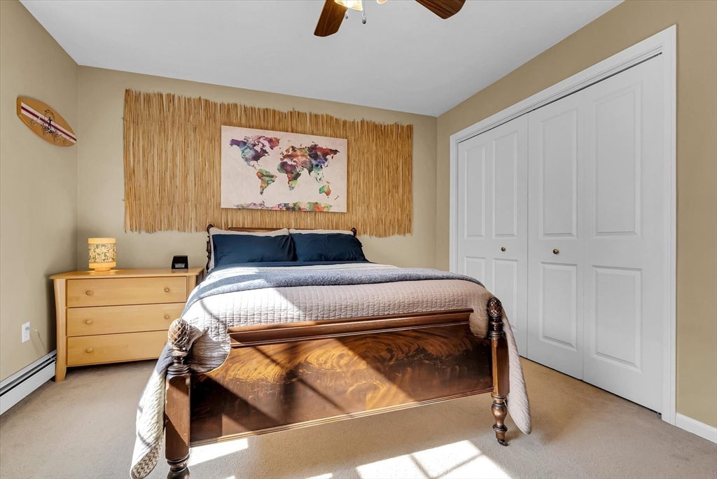 9 Juniper Road Upton, MA 01568 - Photo 22 of 42 a bedroom with a bed and a window