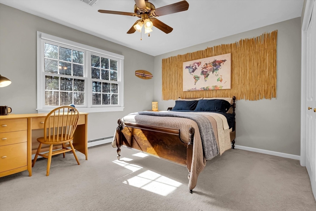 9 Juniper Road Upton, MA 01568 - Photo 23 of 42 a bedroom with a bed and a window