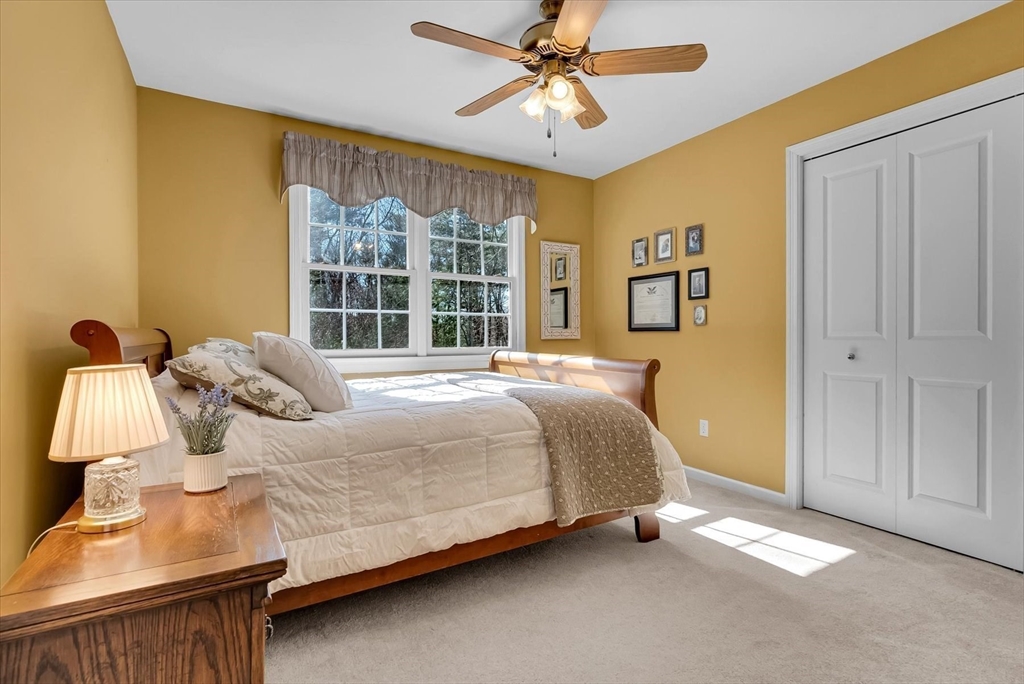 9 Juniper Road Upton, MA 01568 - Photo 24 of 42 a bedroom with a bed and window