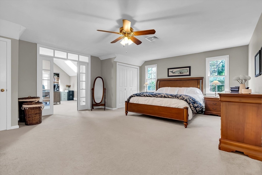 9 Juniper Road Upton, MA 01568 - Photo 26 of 42 a bedroom with a bed couch and a window