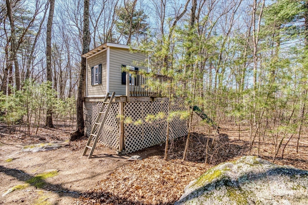 9 Juniper Road Upton, MA 01568 - Photo 36 of 42 a view of a house with a snow in the yard