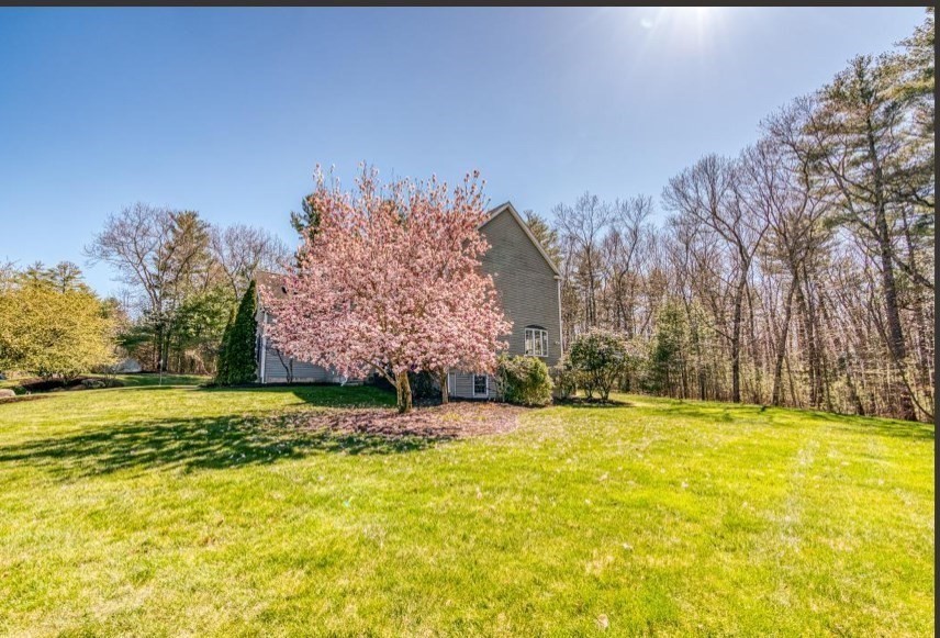 9 Juniper Road Upton, MA 01568 - Photo 40 of 42 a view of swimming pool with an outdoor space and seating area