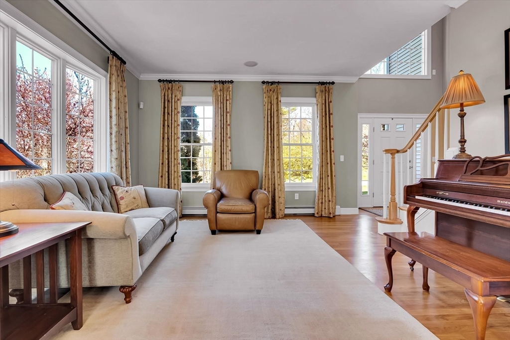 9 Juniper Road Upton, MA 01568 - Photo 4 of 42 a living room with furniture and a large window
