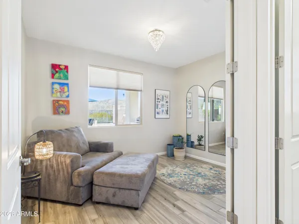 a living room with furniture and a window