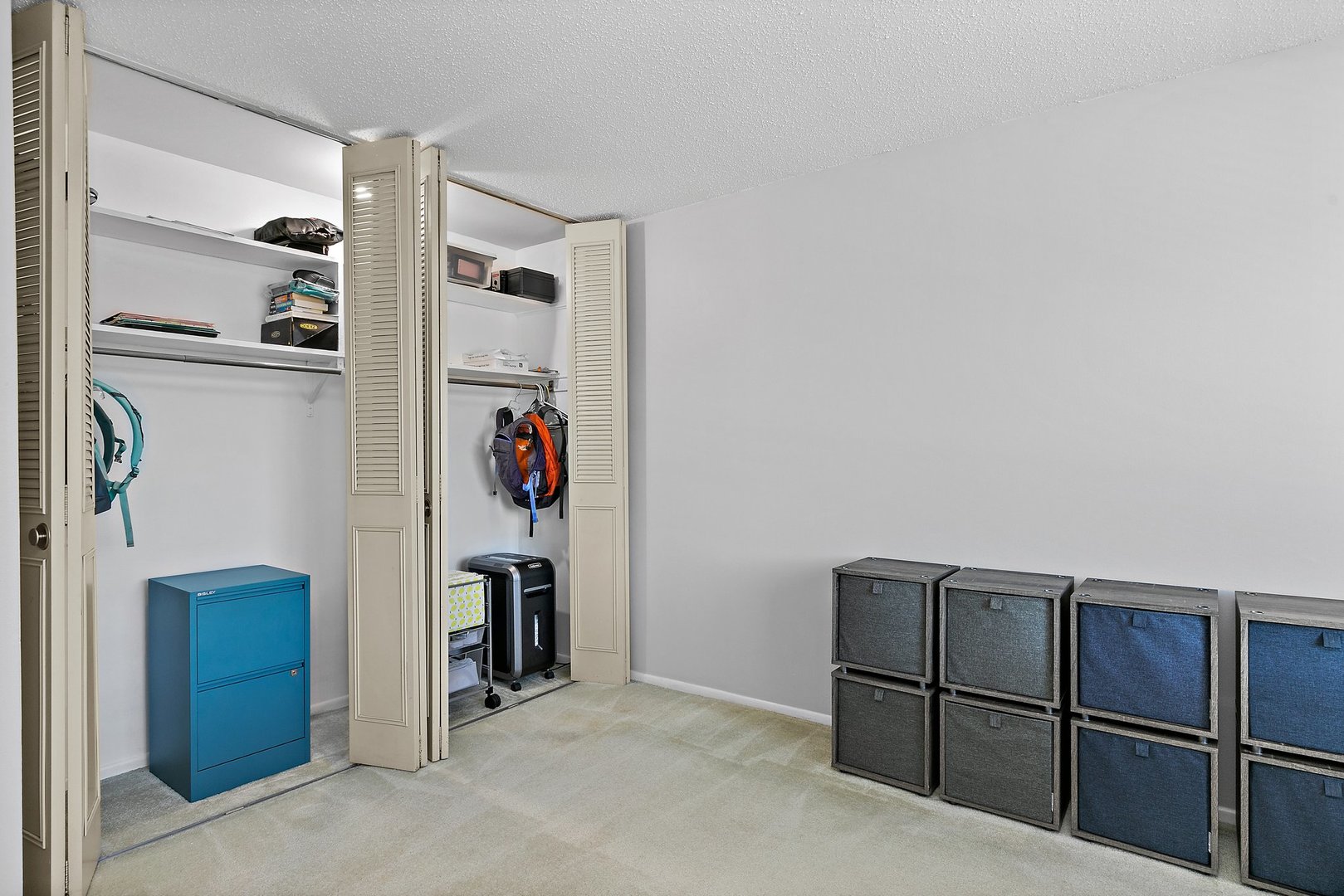 1207 South Old Wilke Road, Unit 409 Rolling Meadows, IL 60005 - Photo 13 of 26 a view of kitchen with refrigerator and window