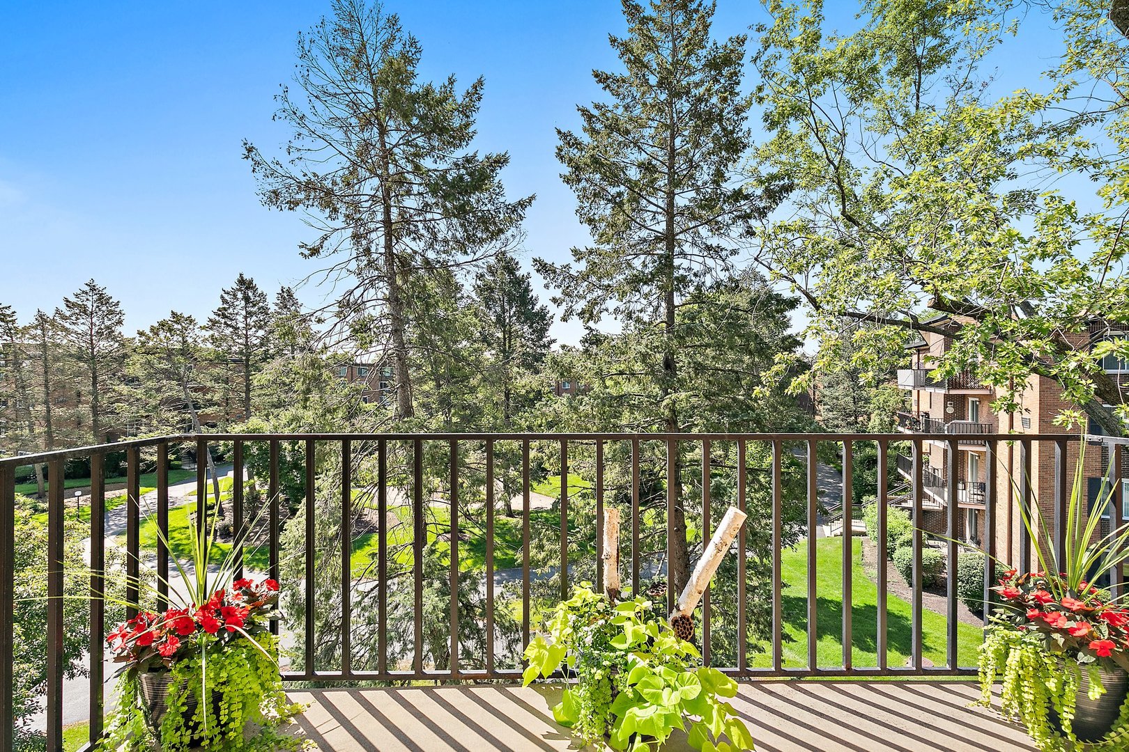 1207 South Old Wilke Road, Unit 409 Rolling Meadows, IL 60005 - Photo 7 of 26 a balcony with outdoor space