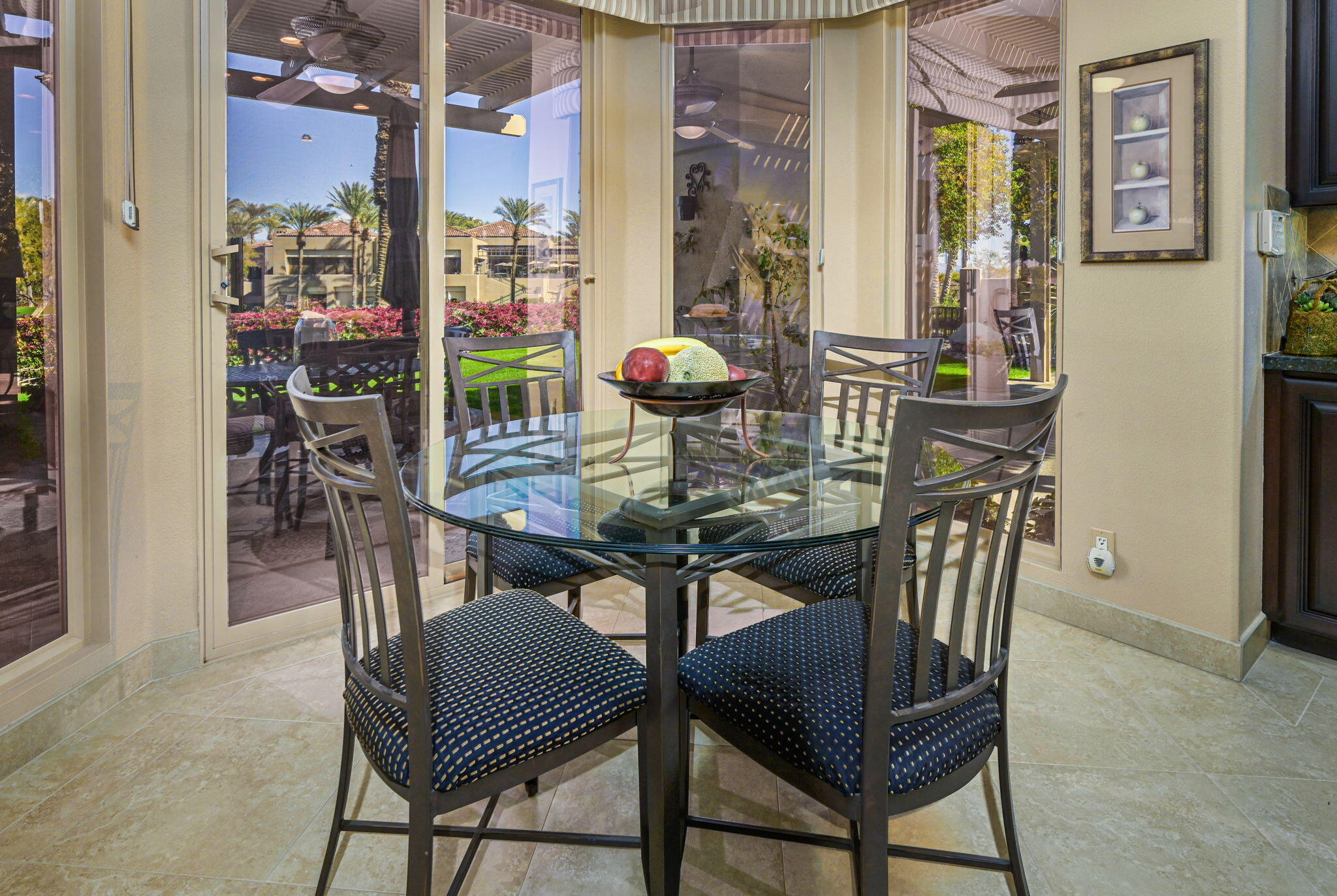 328 Tomahawk Drive Palm Desert, CA 92211 - Photo 11 of 56 a view of a dining room with furniture and chandelier