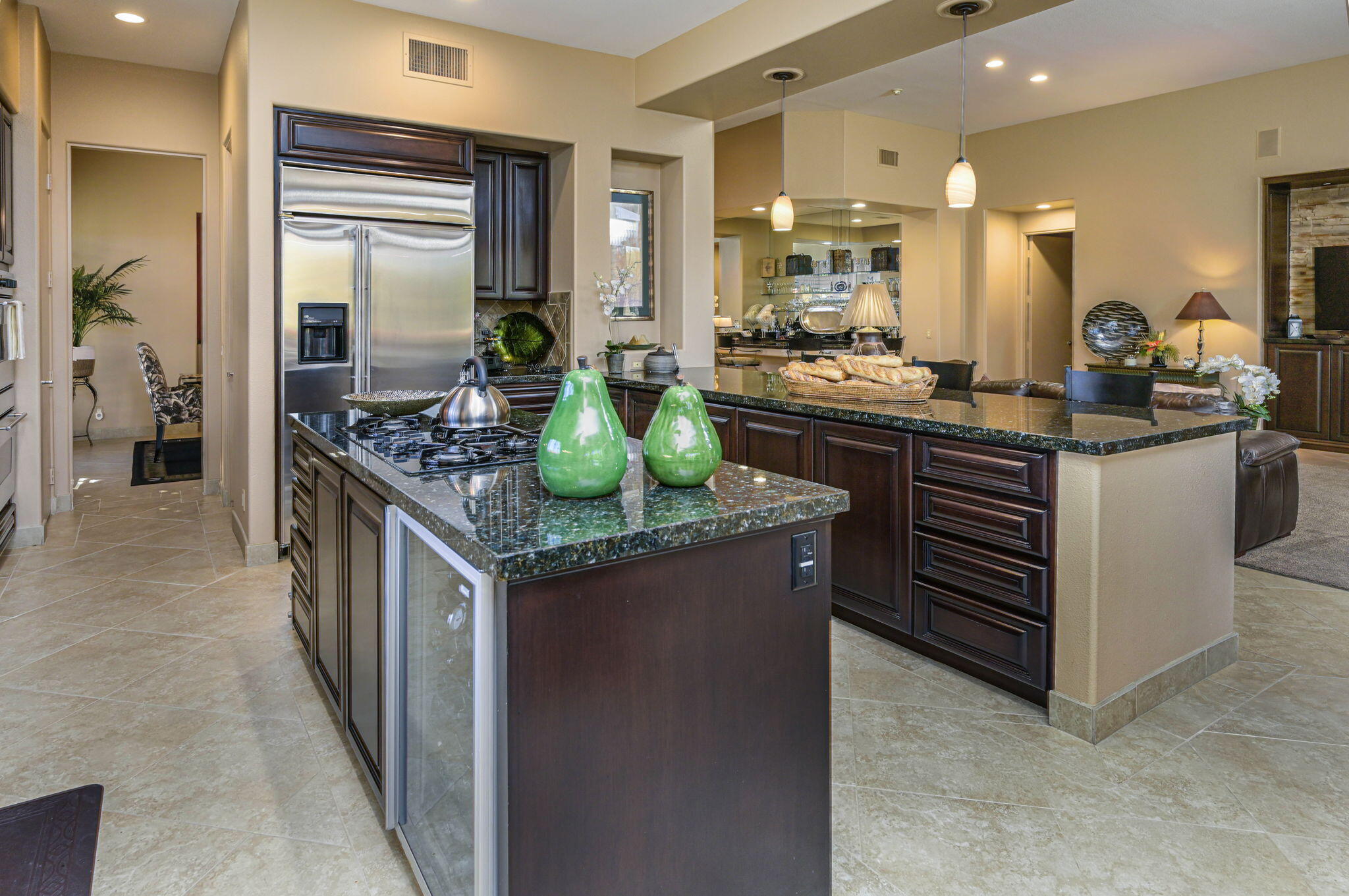 328 Tomahawk Drive Palm Desert, CA 92211 - Photo 12 of 56 a kitchen with stainless steel appliances granite countertop a stove and a sink