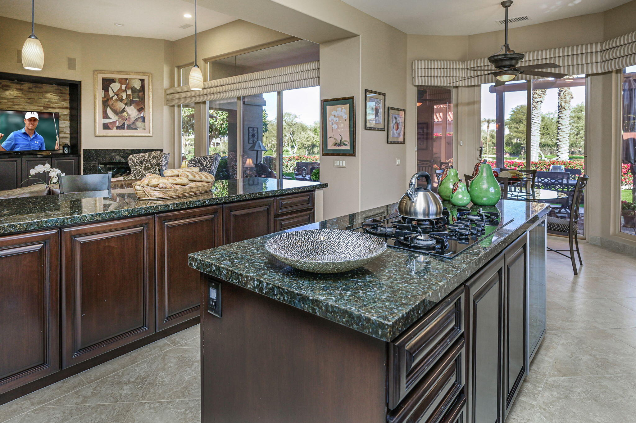 328 Tomahawk Drive Palm Desert, CA 92211 - Photo 13 of 56 a kitchen with granite countertop lots of counter top space and dining table