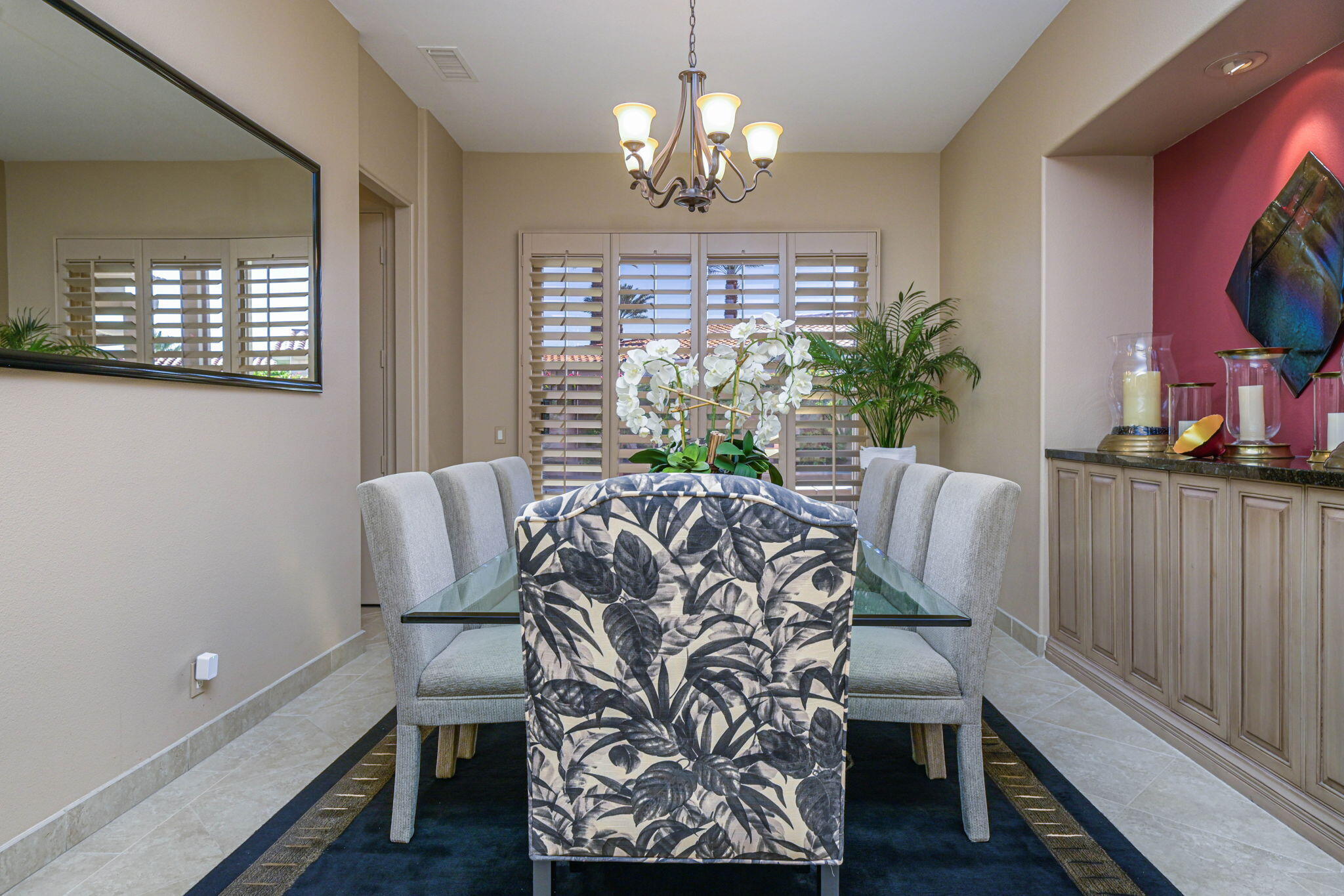 328 Tomahawk Drive Palm Desert, CA 92211 - Photo 15 of 56 a view of a dining room with furniture window and wooden floor
