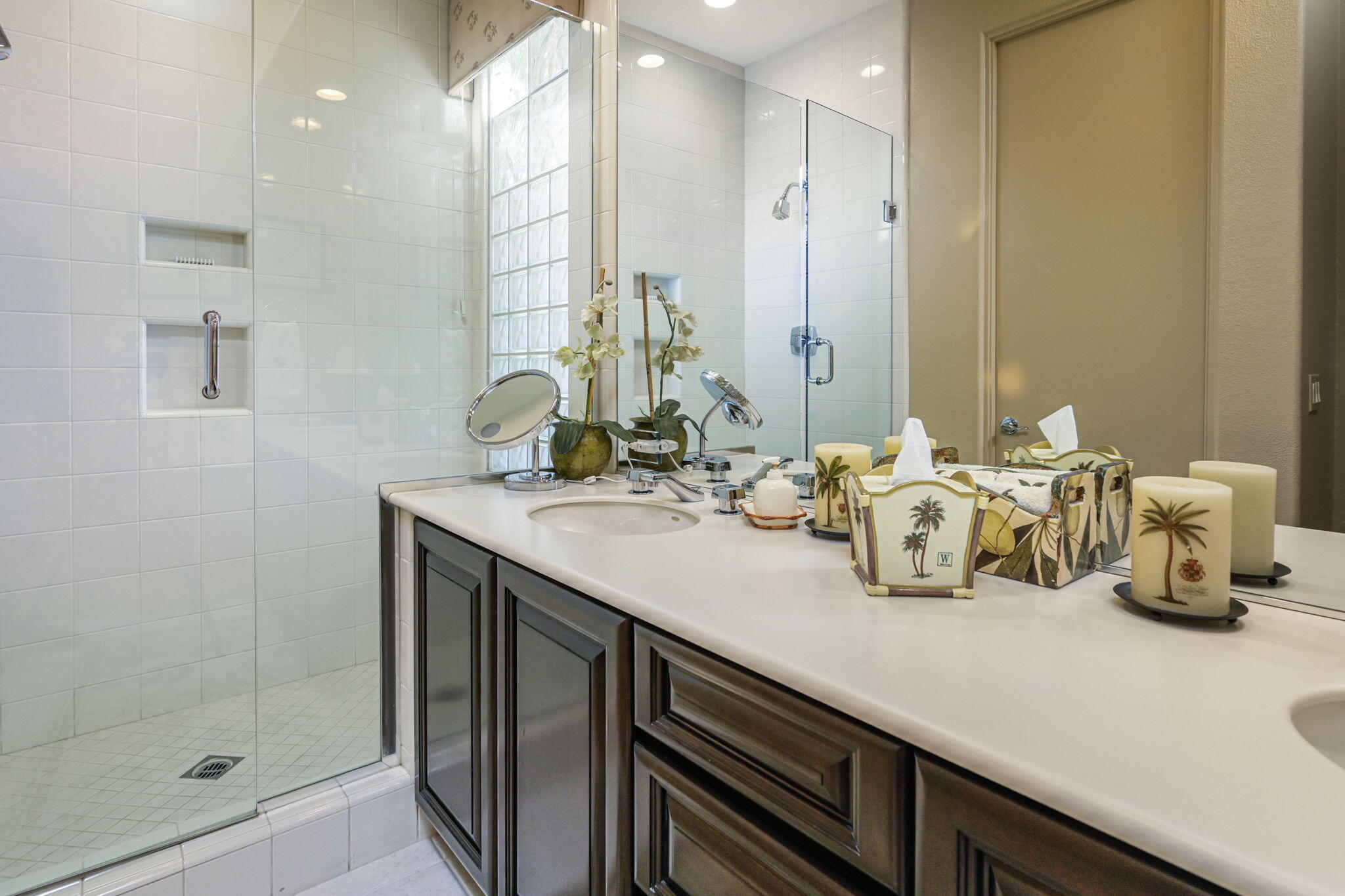 328 Tomahawk Drive Palm Desert, CA 92211 - Photo 22 of 56 a bathroom with a double vanity sink and a mirror