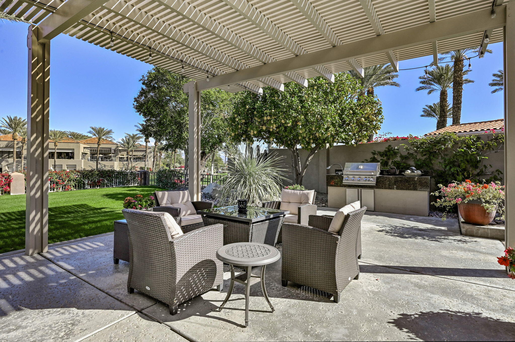 328 Tomahawk Drive Palm Desert, CA 92211 - Photo 30 of 56 a view of a patio in the backyard