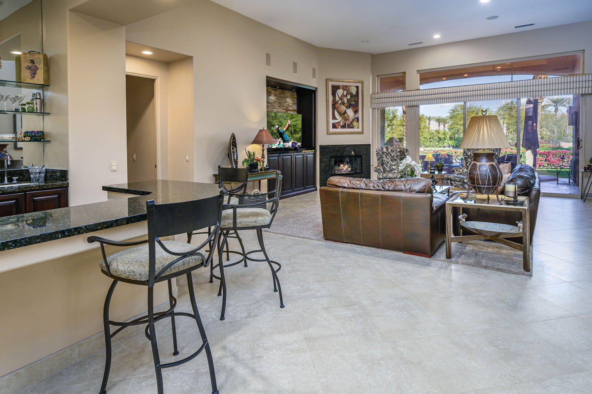 328 Tomahawk Drive Palm Desert, CA 92211 - Photo 3 of 56 a living room with furniture and a large window
