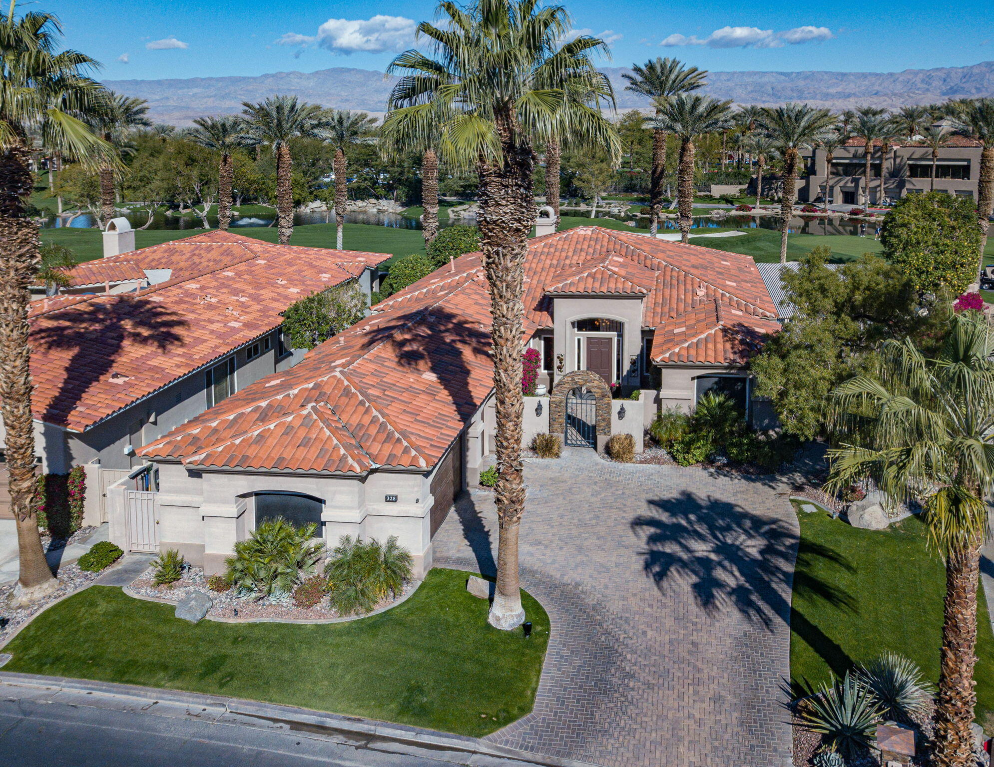 328 Tomahawk Drive Palm Desert, CA 92211 - Photo 41 of 56 a view of a houses with a yard