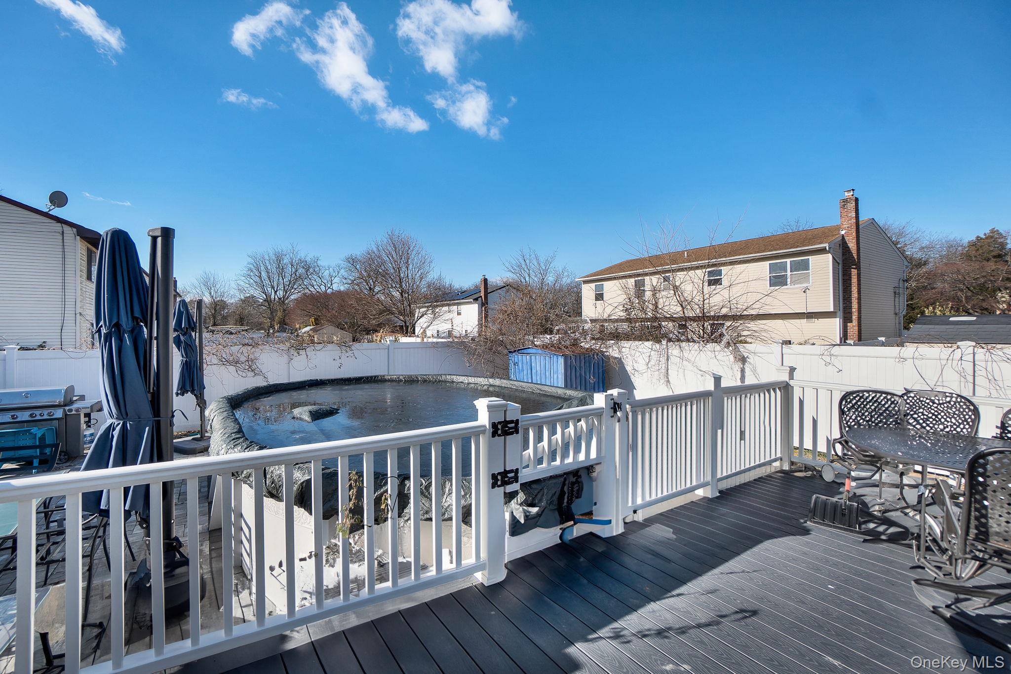 91 Cedar Road Amityville, NY 11701 - Photo 27 of 30 a view of a balcony with furniture