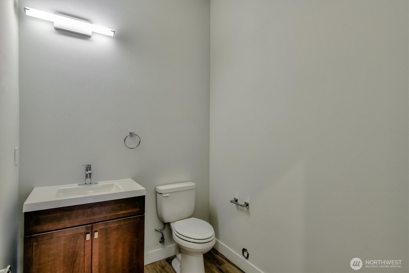 1919 24th Avenue South, Unit D Seattle, WA 98144 - Photo 29 of 35 a bathroom with a sink toilet and vanity