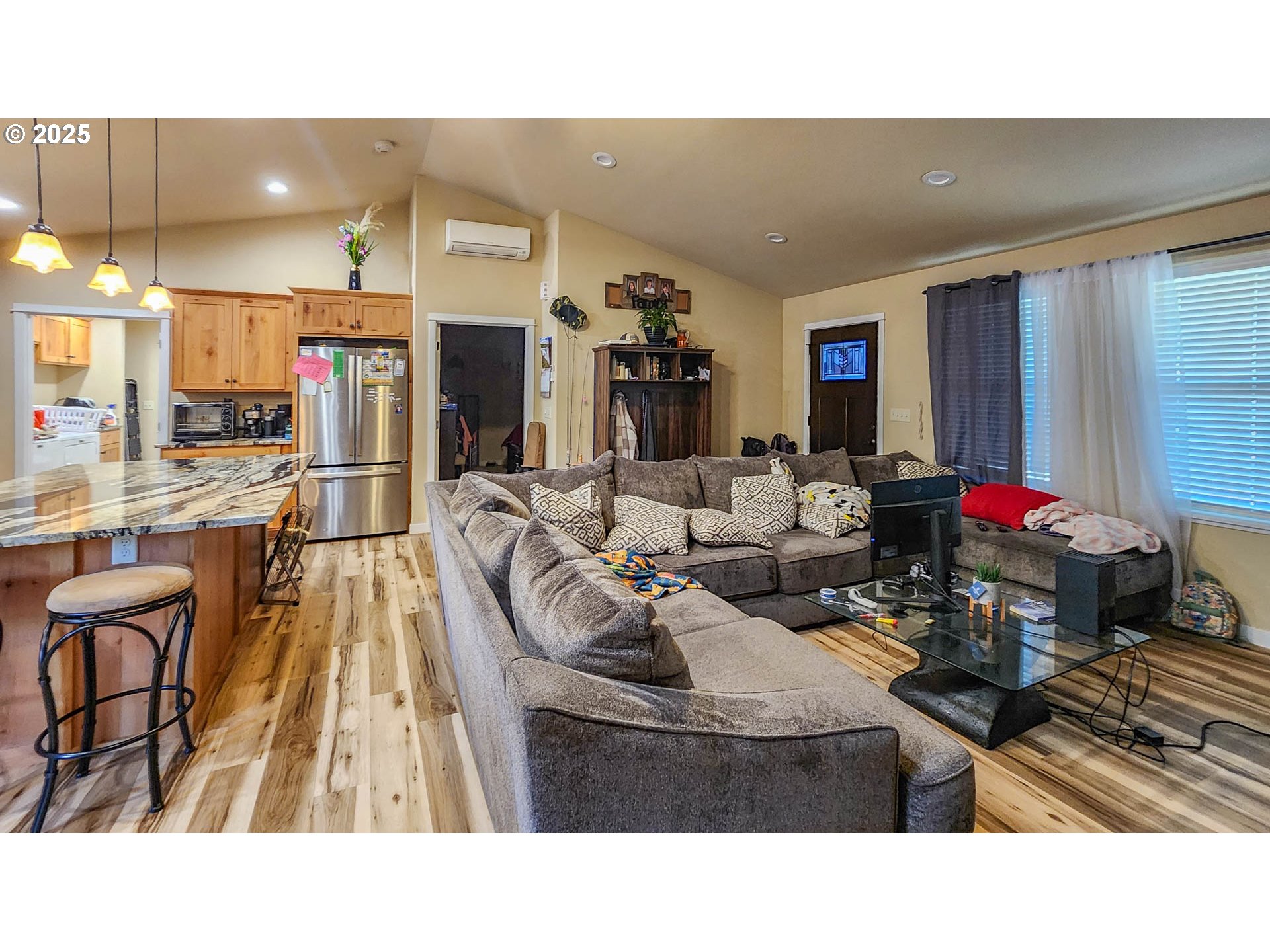 5135 Southwest Grange Road Roseburg, OR 97471 - Photo 14 of 27 a living room with furniture and a flat screen tv