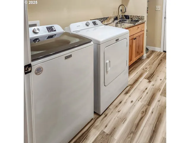 a utility room with dryer and washer