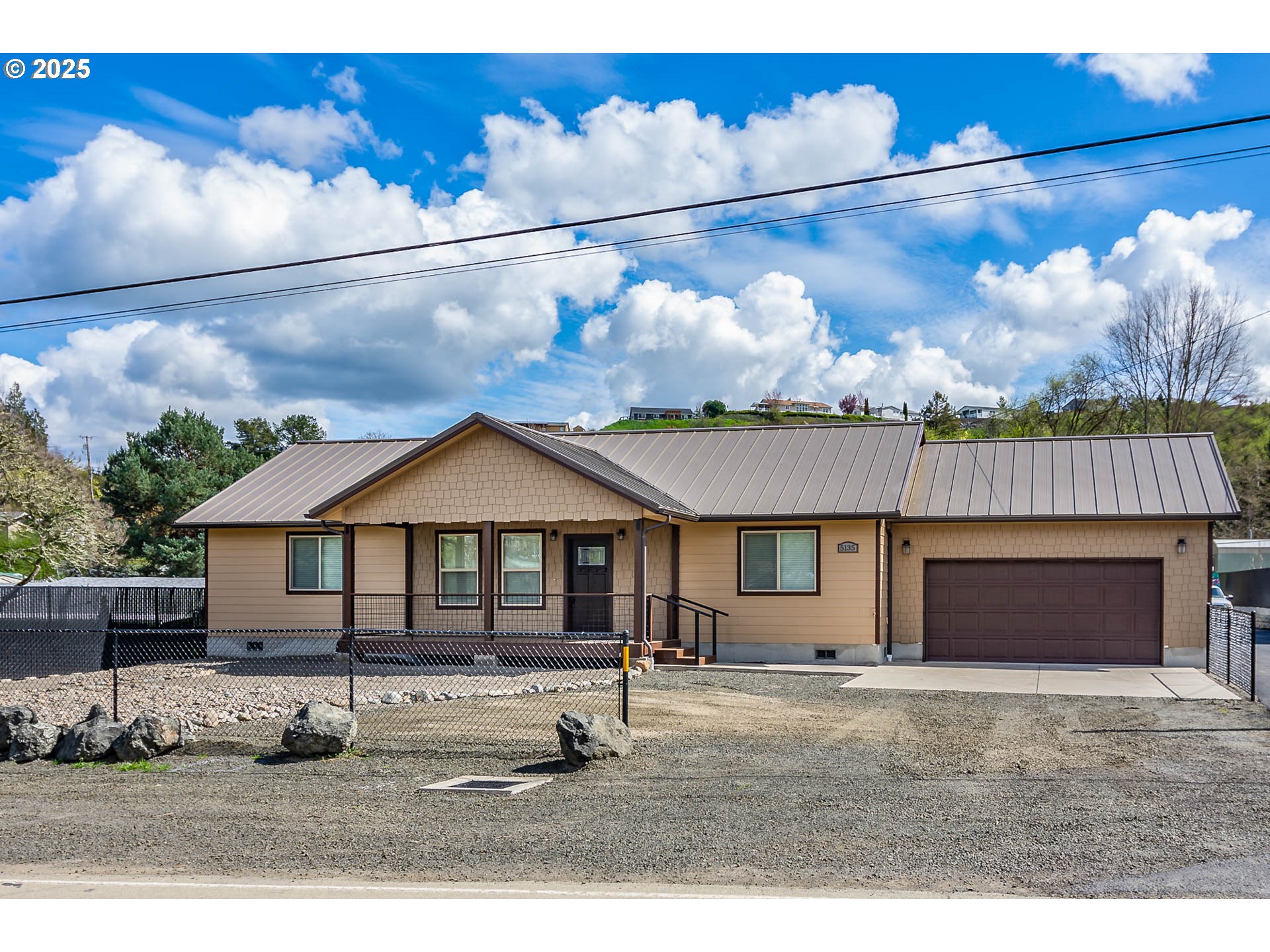 5135 Southwest Grange Road Roseburg, OR 97471 - Photo 2 of 27 a front view of a house with a yard