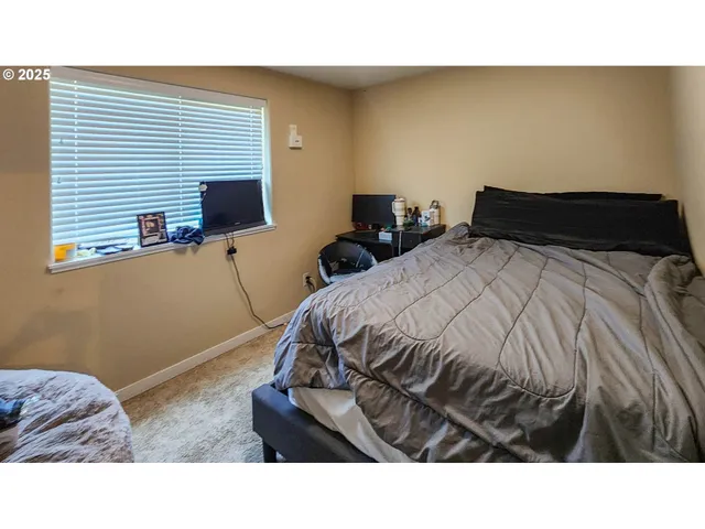 a black and white photo of a couch