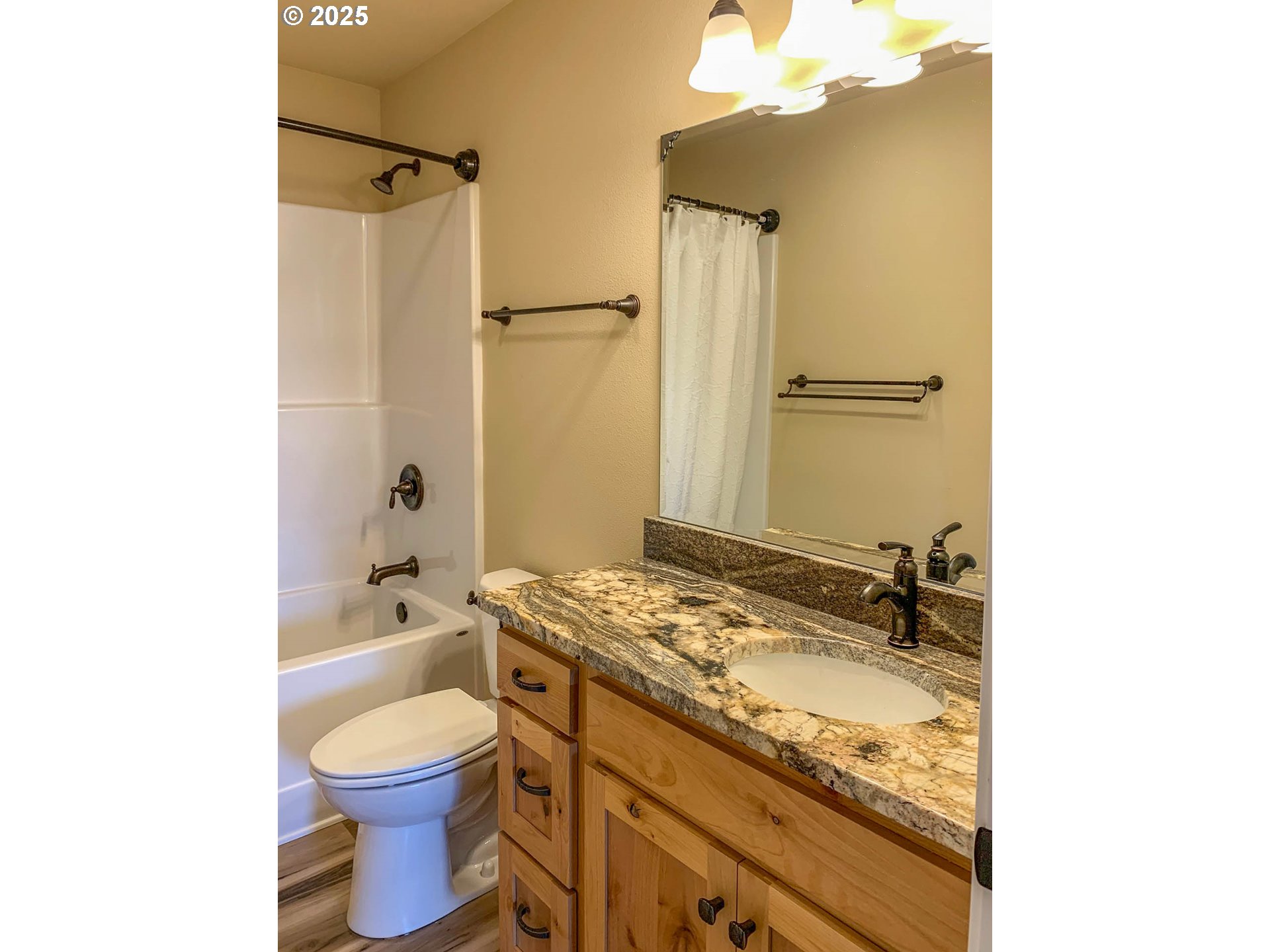 5135 Southwest Grange Road Roseburg, OR 97471 - Photo 26 of 27 a bathroom with a granite countertop sink toilet and shower