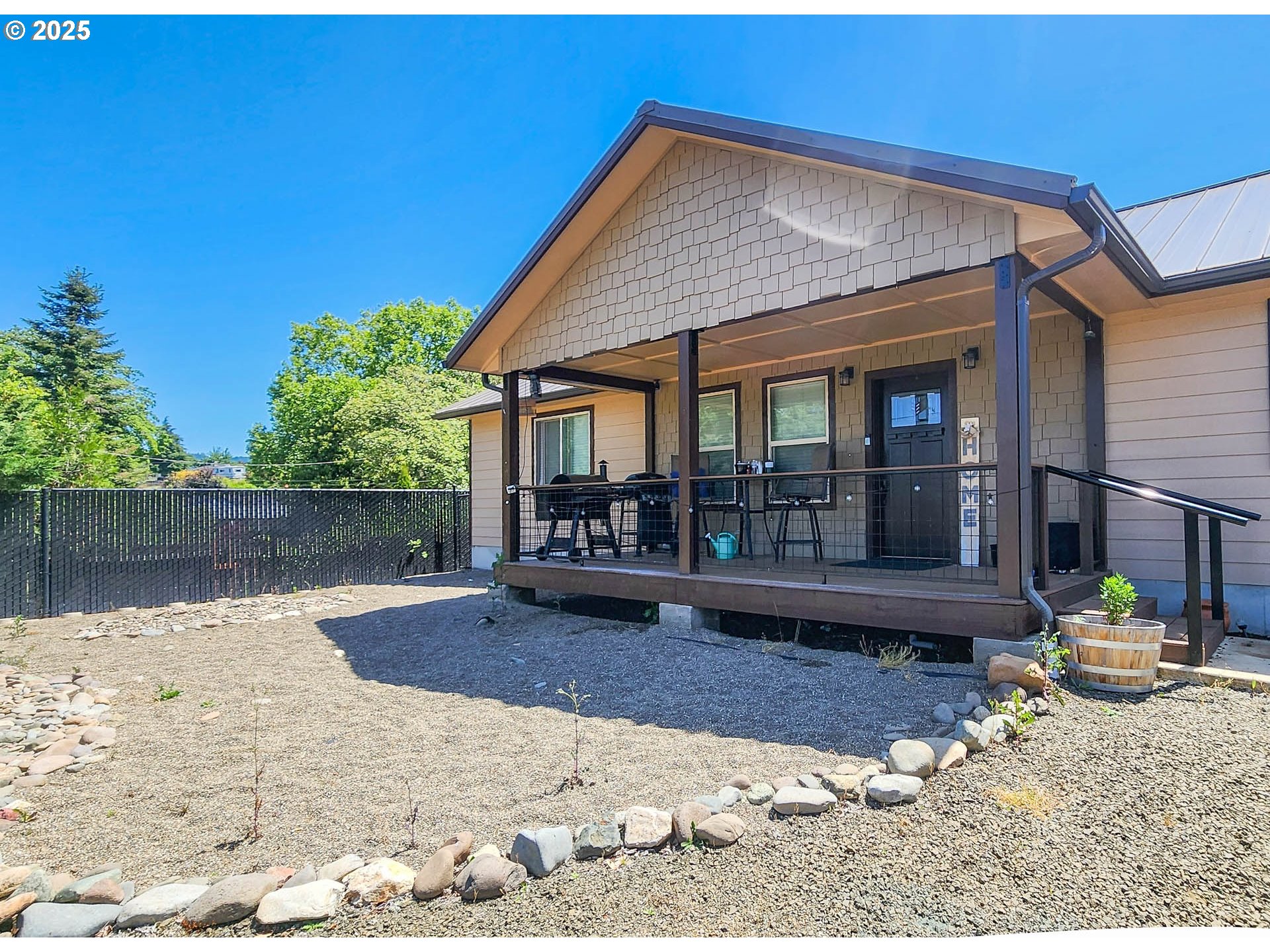 5135 Southwest Grange Road Roseburg, OR 97471 - Photo 5 of 27 a view of a house with a yard