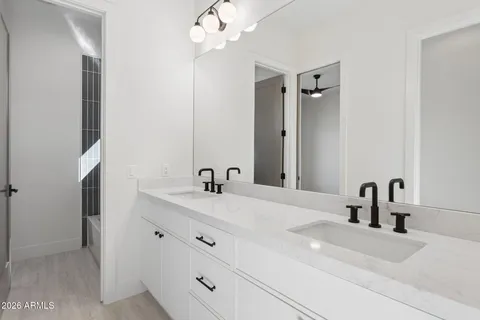 a bathroom with a bathtub and shower