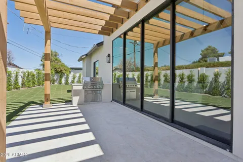a view of swimming pool with a patio