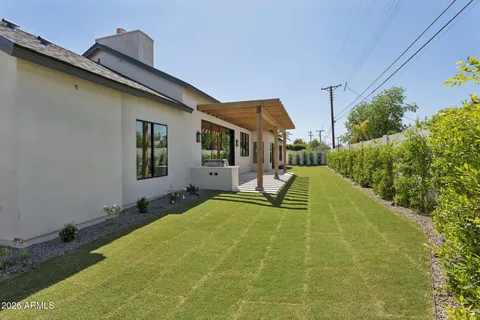 a front view of house with yard