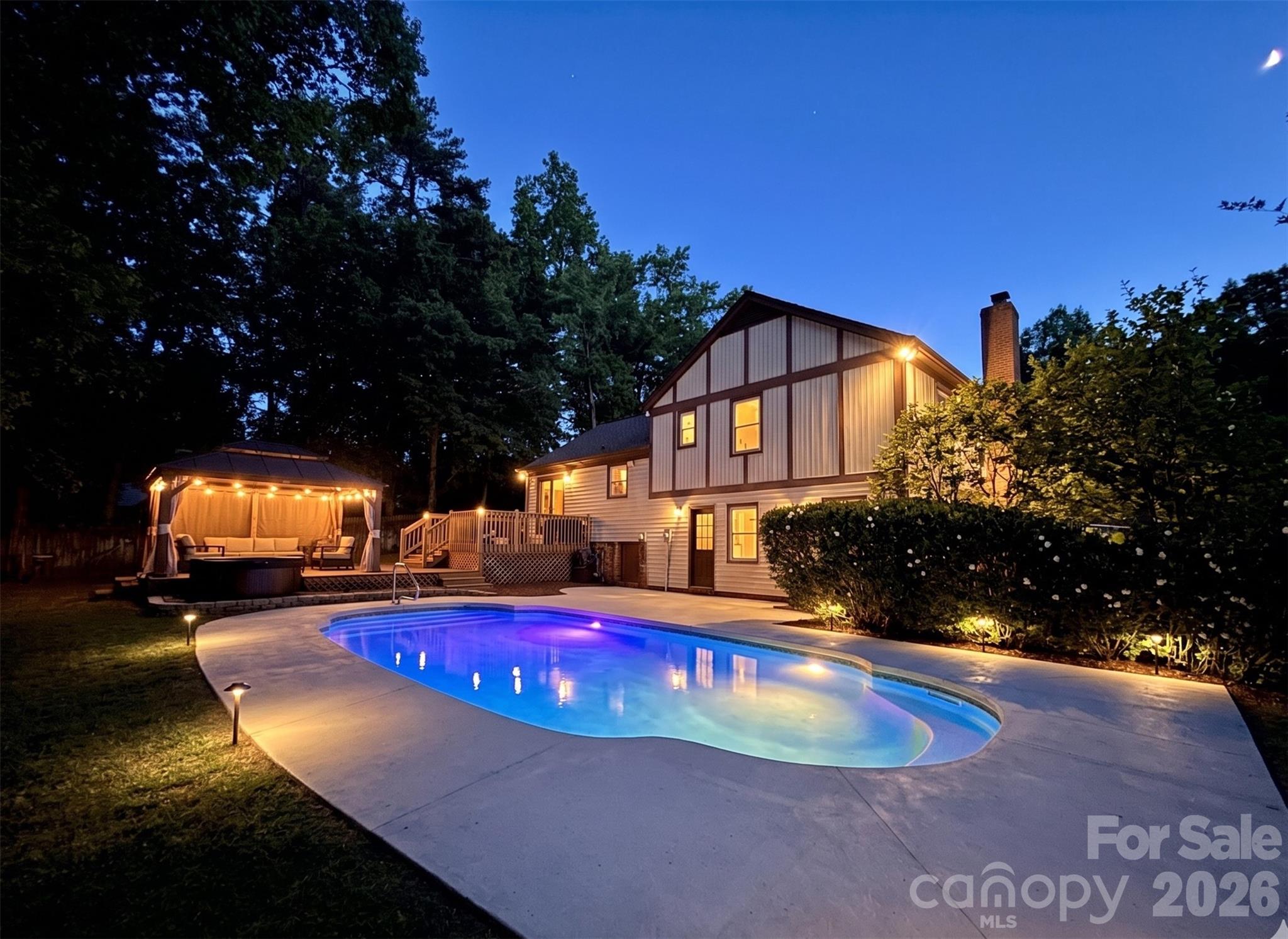 824 Riverwood Road Charlotte, NC 28270 - Photo 30 of 37 a view of a house with swimming pool and sitting area