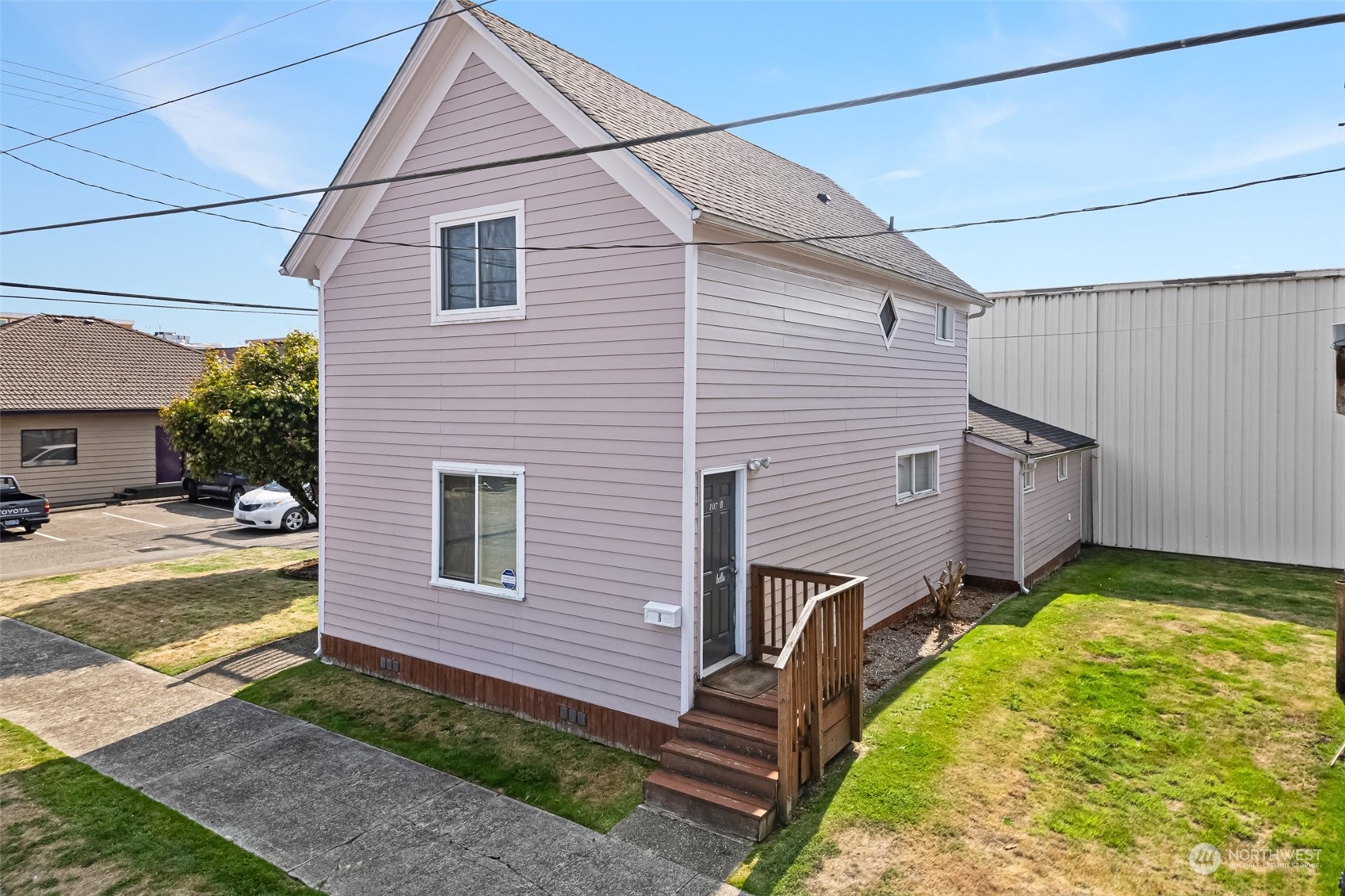 107 South M Street Aberdeen, WA 98520 - Photo 12 of 24 a view of a backyard with a garden