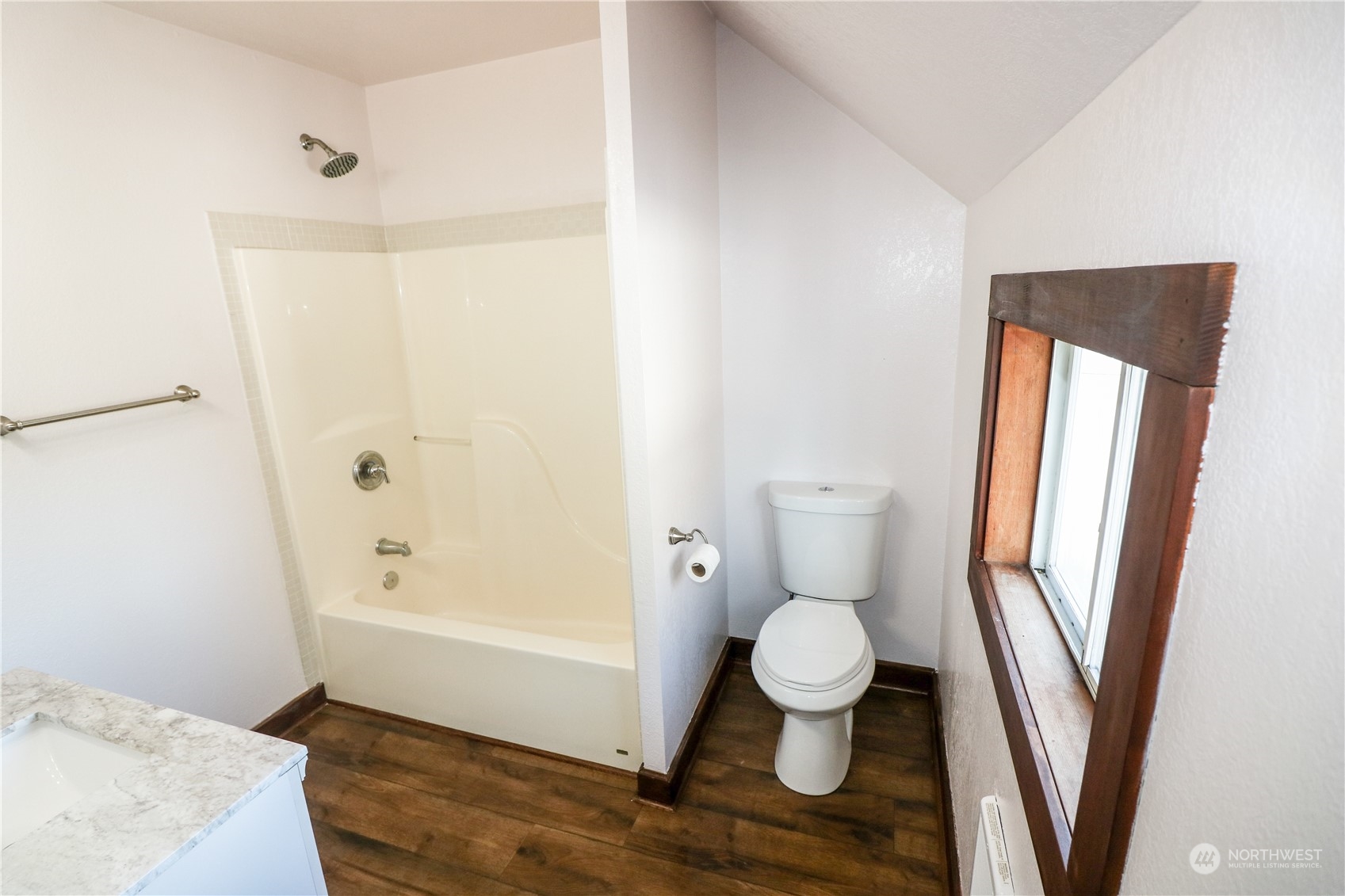 107 South M Street Aberdeen, WA 98520 - Photo 21 of 24 a bathroom with a toilet and a shower