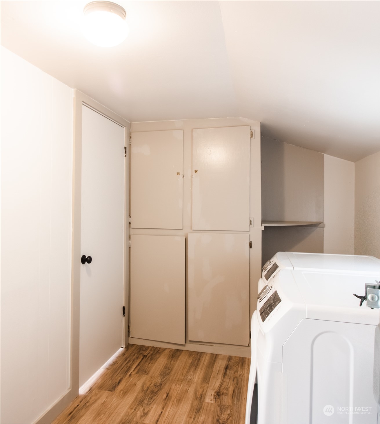 107 South M Street Aberdeen, WA 98520 - Photo 9 of 24 a view of storage and utility room with washer and dryer