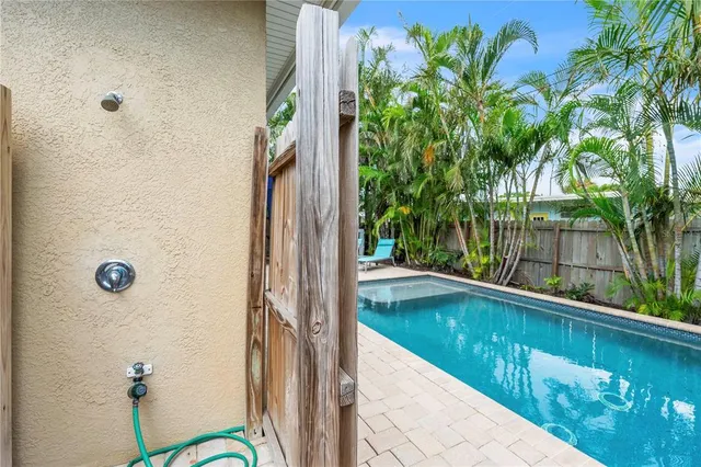 a view of swimming pool from a balcony
