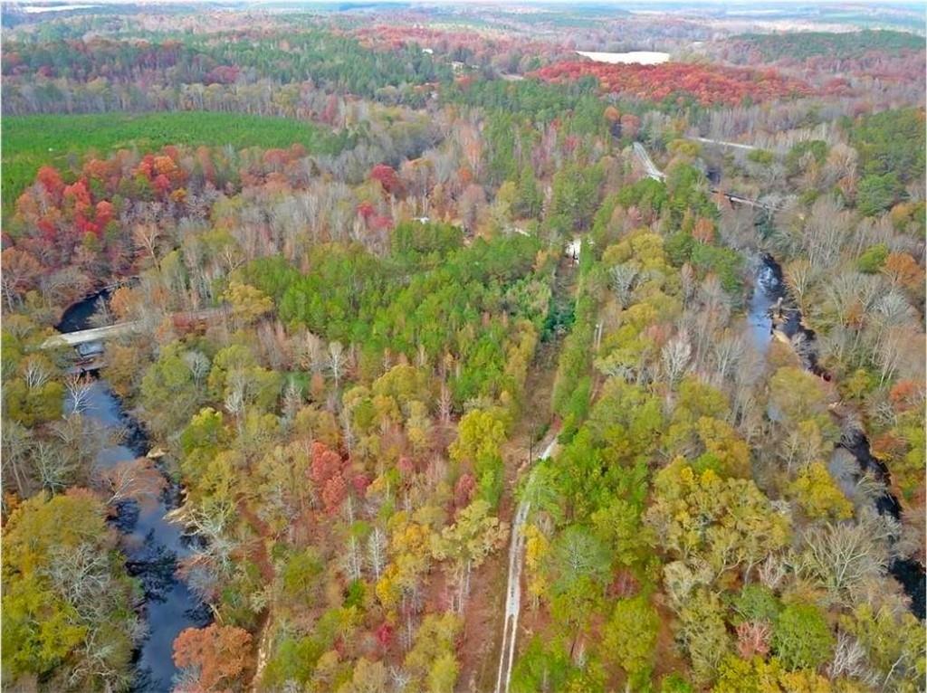 702 Liner Road Tallapoosa, GA 30176 - Photo 4 of 14 a view of lake with a city