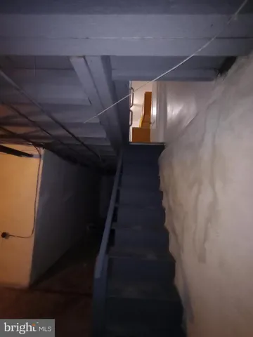 a view of a brick building with many windows