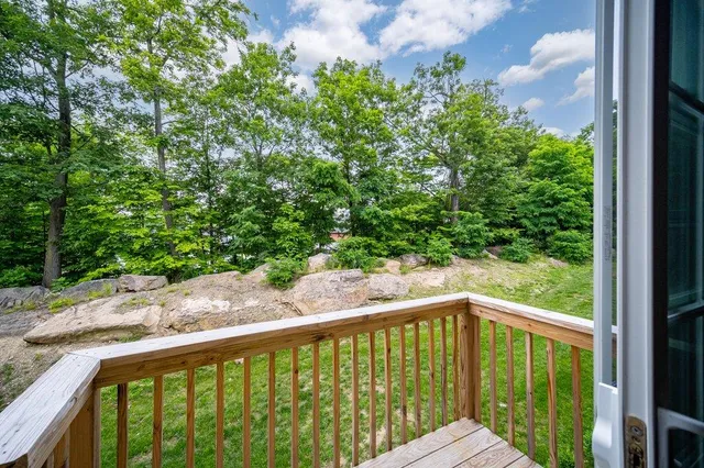 a view of an empty room with a balcony