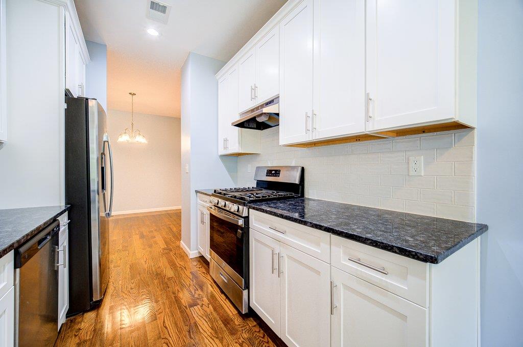 31 Pinto Road Middletown, NY 10941 - Photo 4 of 23 a kitchen with stainless steel appliances granite countertop a stove a sink and a refrigerator
