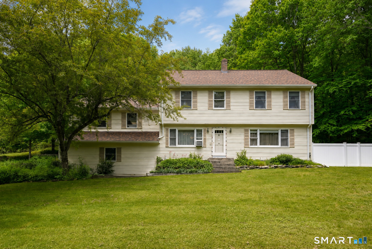 155 Lake Harwinton Road Harwinton, CT 06791 - Photo 39 of 39 a front view of a house with a garden