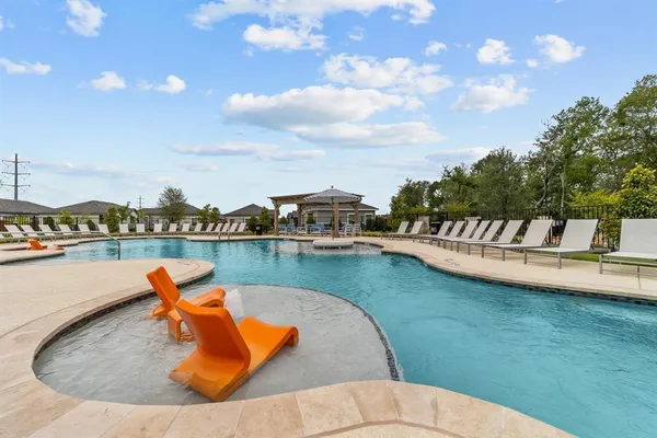 swimming pool with lake view